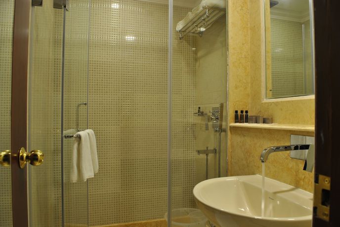 Imagen de la habitación del Hotel Dynasty, Guwahati. Foto 8