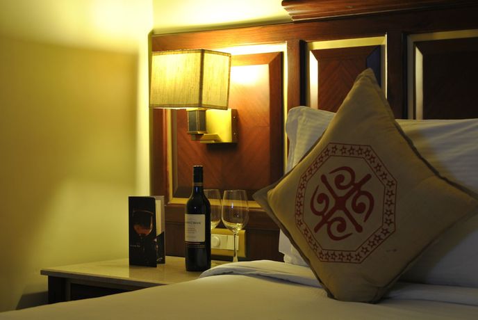 Imagen de la habitación del Hotel Dynasty, Guwahati. Foto 11