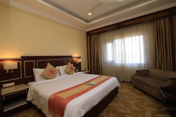 Imagen de la habitación del Hotel Dynasty, Guwahati. Foto 16