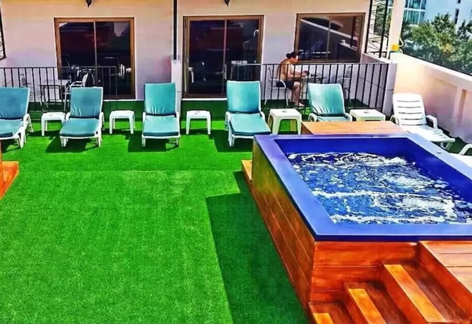 Imagen de la piscina del Hotel Dynasty Inn Pattaya. Foto 19