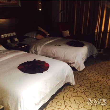 Imagen de la habitación del Hotel Dynasty International Hotel Kunming. Foto 6