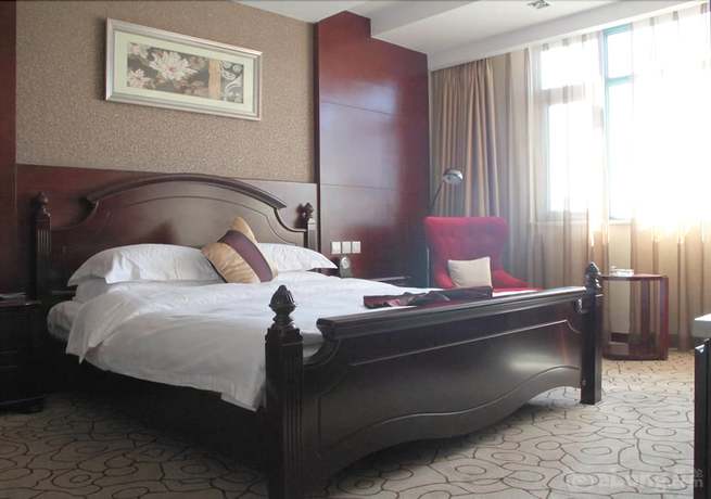 Imagen de la habitación del Hotel Dynasty International Hotel Kunming. Foto 12