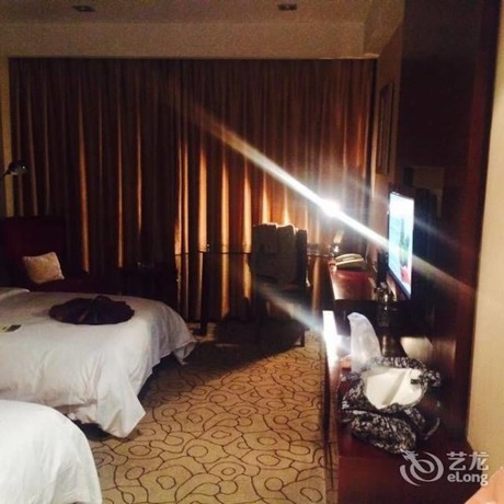 Imagen de la habitación del Hotel Dynasty International Hotel Kunming. Foto 13