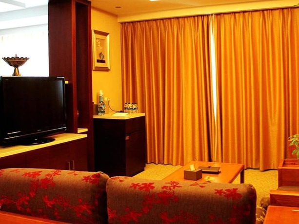 Imagen de la habitación del Hotel Dynasty International Hotel Kunming. Foto 16
