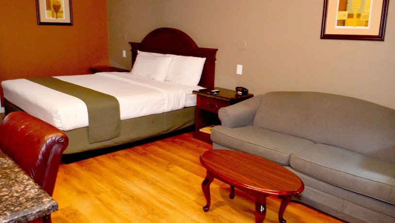 Imagen de la habitación del Hotel Dynasty Suites Riverside. Foto 9
