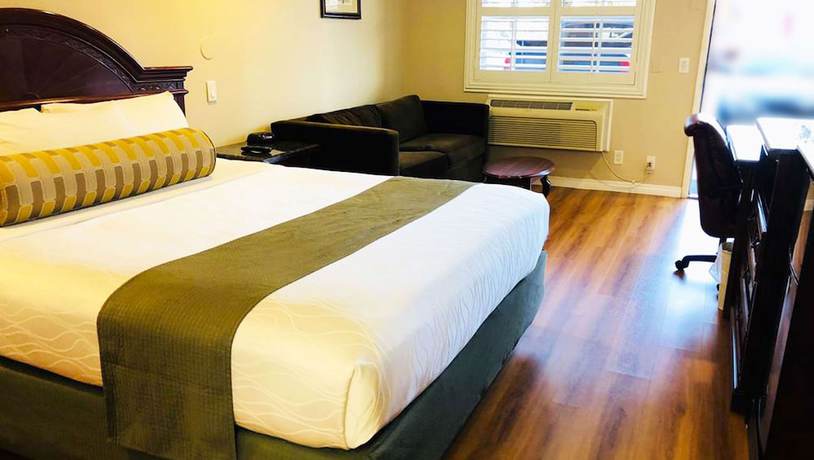 Imagen de la habitación del Hotel Dynasty Suites Riverside. Foto 12