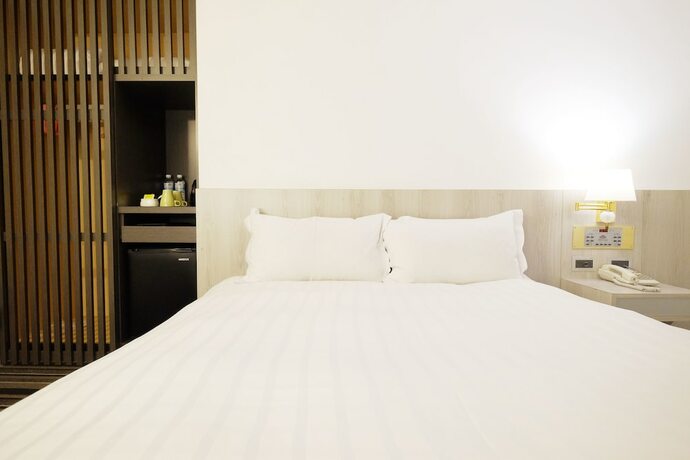Imagen de la habitación del Hotel Dynasty, Tainan. Foto 12