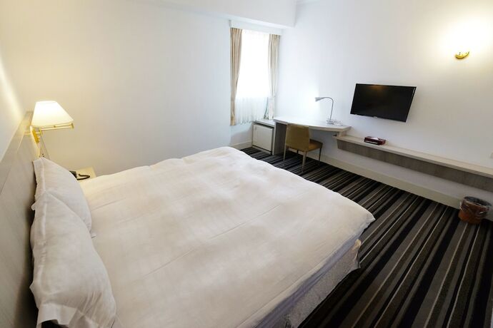 Imagen de la habitación del Hotel Dynasty, Tainan. Foto 16