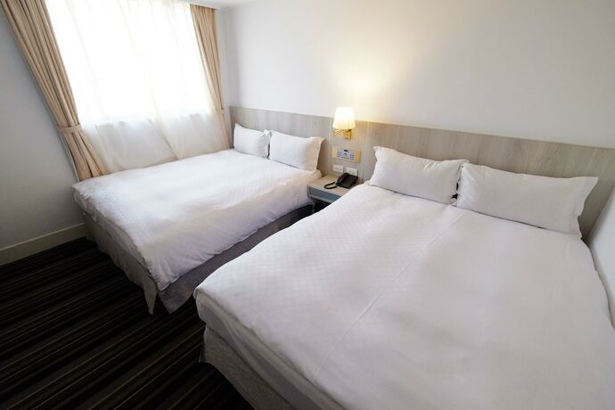 Imagen de la habitación del Hotel Dynasty, Tainan. Foto 17