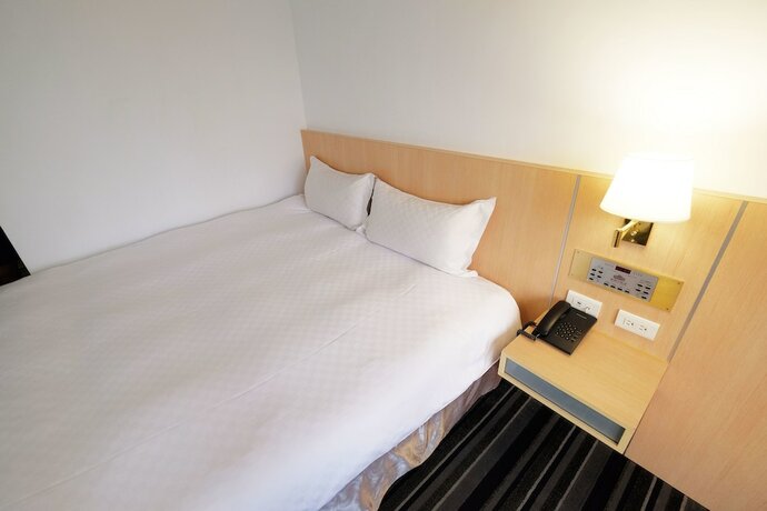 Imagen de la habitación del Hotel Dynasty, Tainan. Foto 25