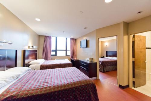Imagen general del Hotel Dynasty and Suites New York LaGuardia. Foto 3