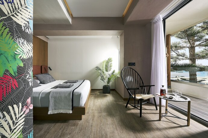 Imagen de la habitación del Hotel Dyo Suites. Foto 11