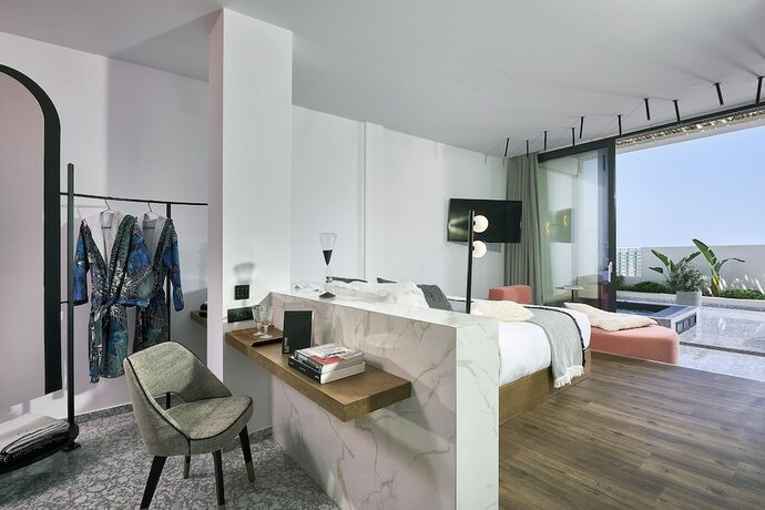 Imagen de la habitación del Hotel Dyo Suites. Foto 13