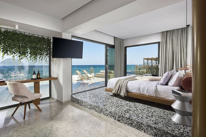 Imagen de la habitación del Hotel Dyo Suites. Foto 16