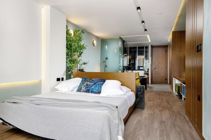 Imagen de la habitación del Hotel Dyo Suites. Foto 20