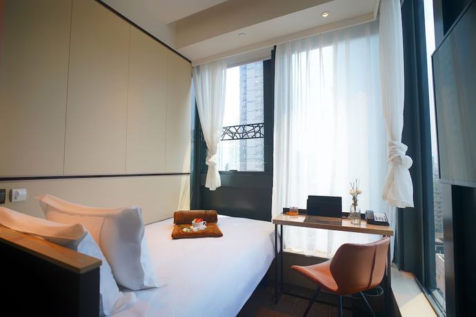 Imagen de la habitación del Hotel E Hong Kong. Foto 8