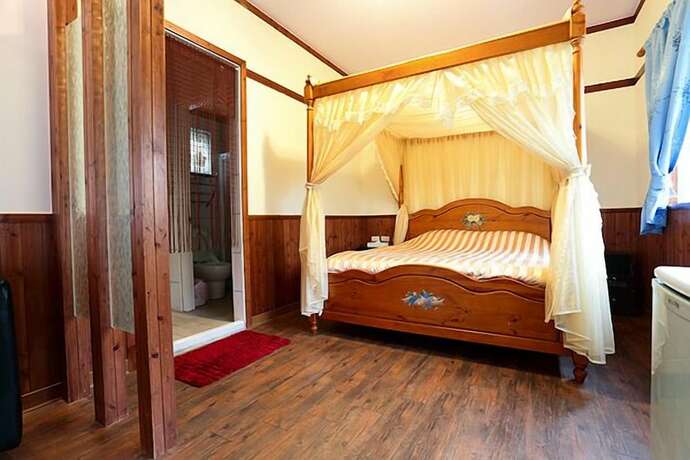 Imagen de la habitación del Hotel E Moh BandB. Foto 20