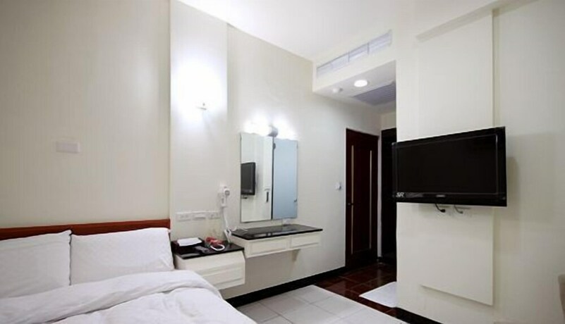 Imagen de la habitación del Hotel E Moon. Foto 17