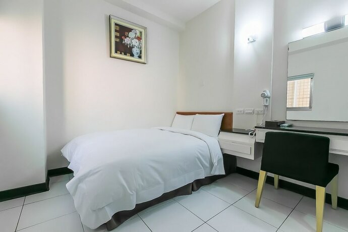 Imagen de la habitación del Hotel E Moon. Foto 18