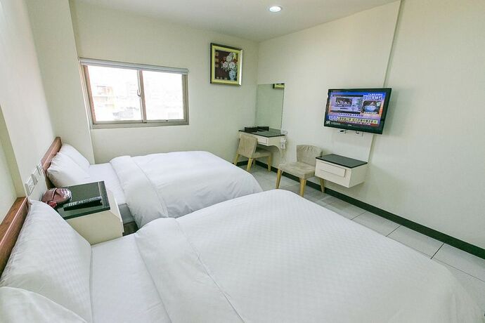 Imagen de la habitación del Hotel E Moon. Foto 21