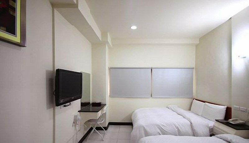 Imagen de la habitación del Hotel E Moon. Foto 22