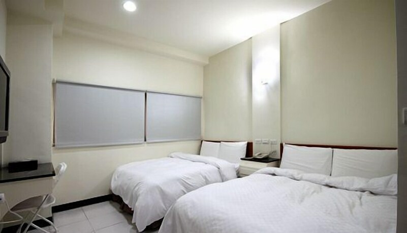 Imagen de la habitación del Hotel E Moon. Foto 23