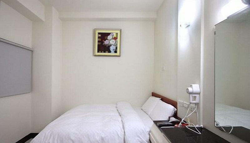 Imagen de la habitación del Hotel E Moon. Foto 24