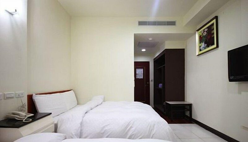 Imagen de la habitación del Hotel E Moon. Foto 25