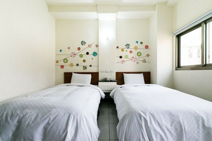 Imagen de la habitación del Hotel E Moon. Foto 26