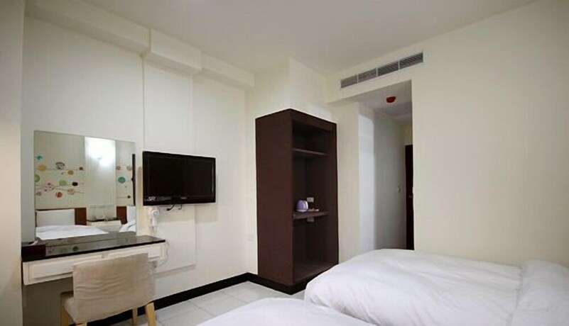 Imagen de la habitación del Hotel E Moon. Foto 30