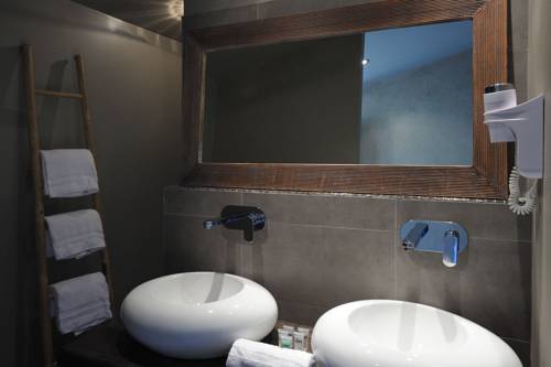Imagen de la habitación del Hotel E Tre Stelle. Foto 10