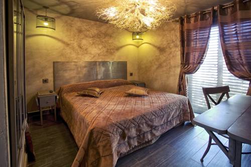 Imagen de la habitación del Hotel E Tre Stelle. Foto 12