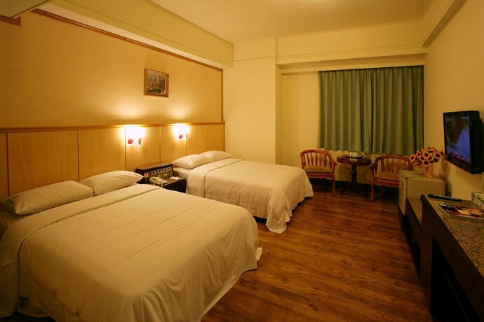 Imagen de la habitación del Hotel E Tung. Foto 20