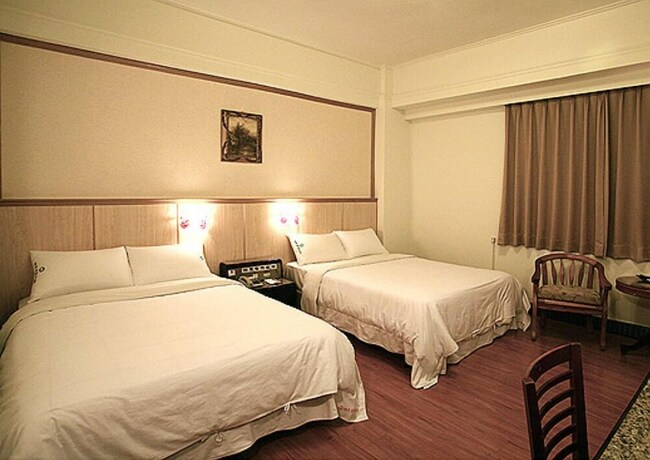 Imagen de la habitación del Hotel E Tung. Foto 27