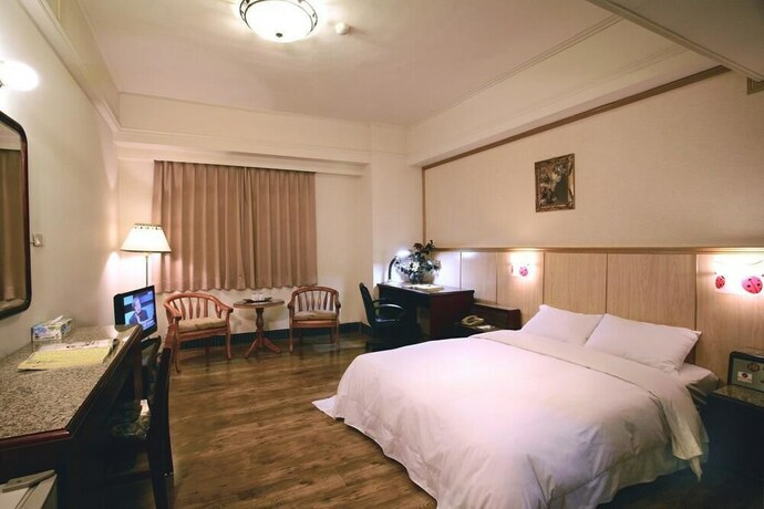 Imagen de la habitación del Hotel E Tung. Foto 31