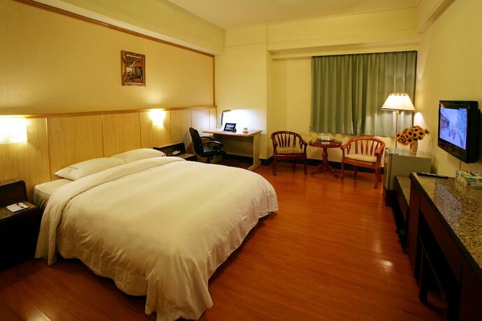 Imagen de la habitación del Hotel E Tung. Foto 32