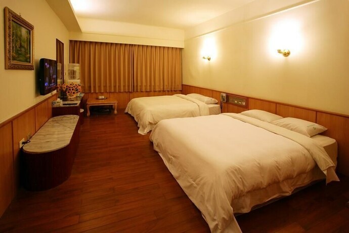 Imagen de la habitación del Hotel E Tung. Foto 33