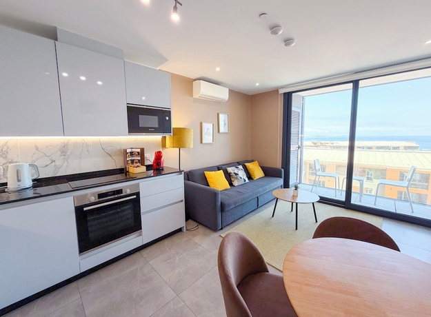 Imagen de la habitación del Hotel E1 Suites and Spa. Foto 2