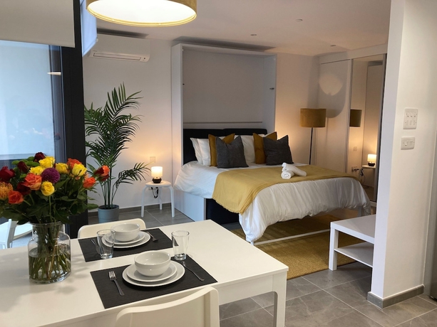 Imagen de la habitación del Hotel E1 Suites and Spa. Foto 8