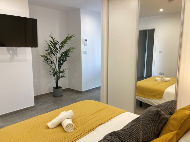 Imagen de la habitación del Hotel E1 Suites and Spa. Foto 12