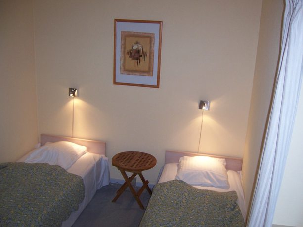 Imagen de la habitación del Hotel E4. Foto 13