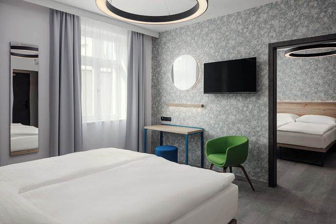 Imagen de la habitación del Hotel EA Hotel Moment Self Check-In. Foto 8