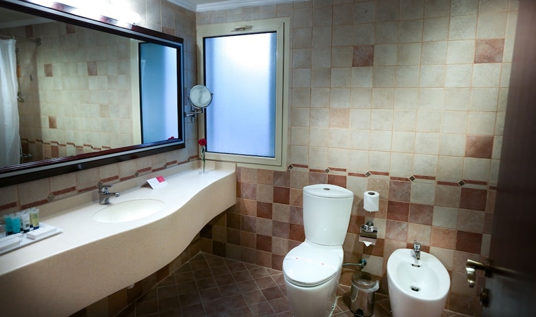 Imagen de la habitación del Hotel EASTYARD Dammam. Foto 10