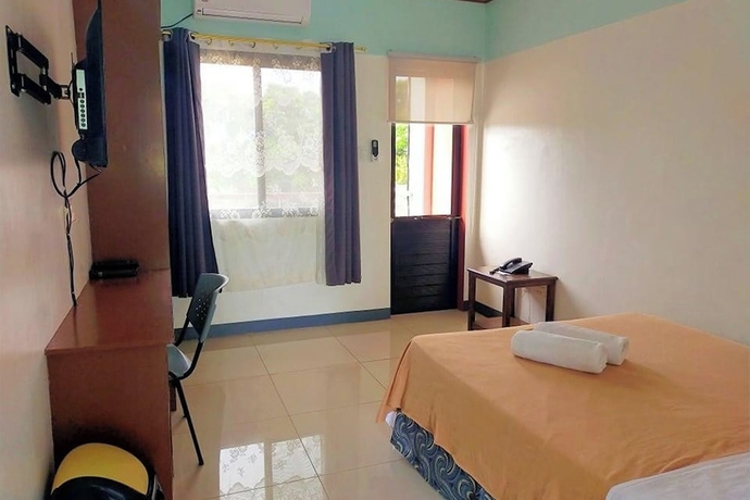Imagen de la habitación del Hotel EC near Laoag Airport. Foto 2