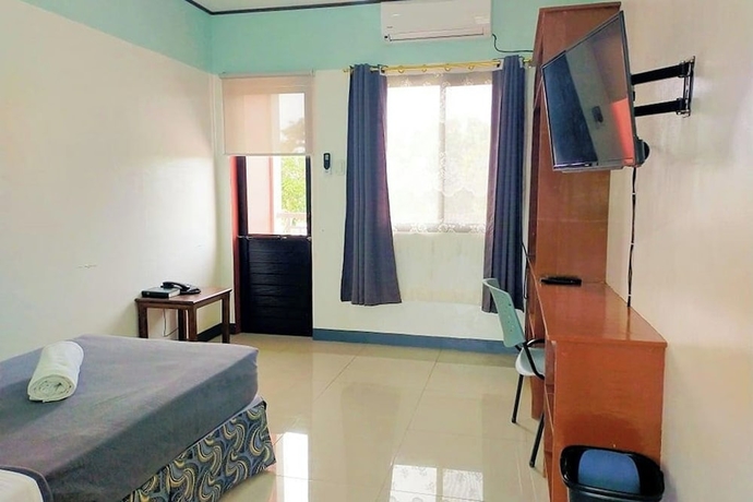 Imagen de la habitación del Hotel EC near Laoag Airport. Foto 4