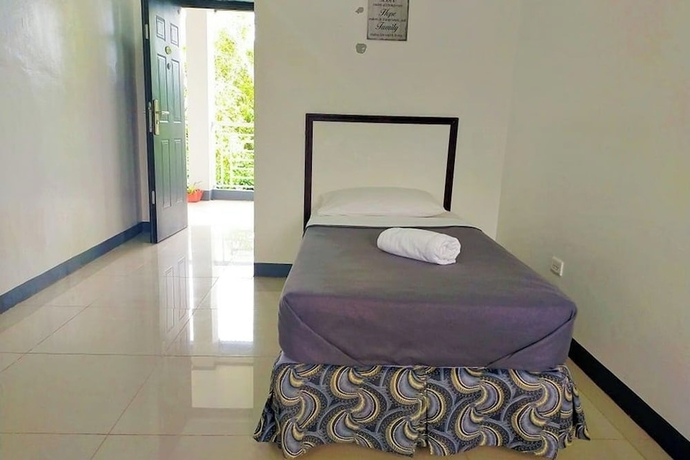 Imagen de la habitación del Hotel EC near Laoag Airport. Foto 5