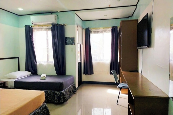Imagen de la habitación del Hotel EC near Laoag Airport. Foto 6