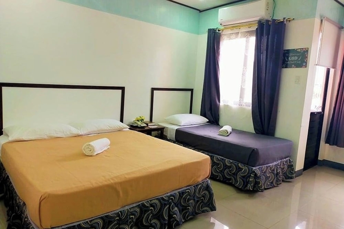 Imagen de la habitación del Hotel EC near Laoag Airport. Foto 7