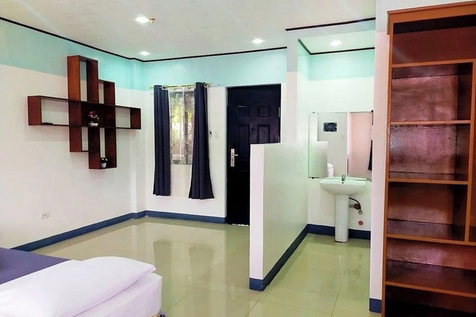 Imagen de la habitación del Hotel EC near Laoag Airport. Foto 9