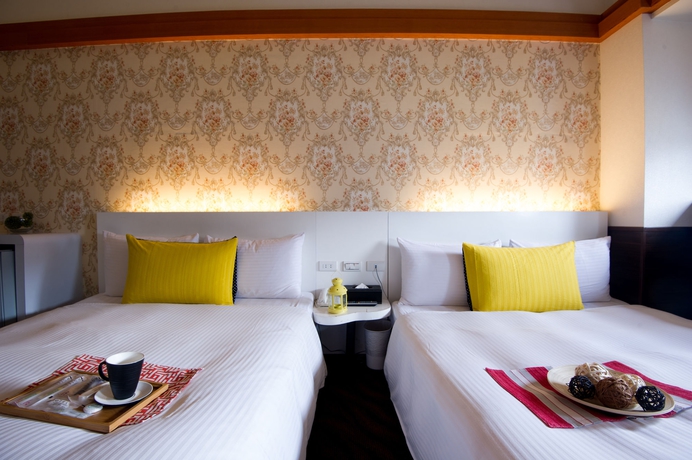 Imagen de la habitación del Hotel ECFA Kunming. Foto 2